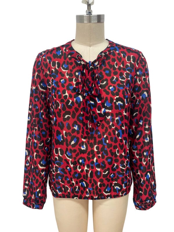 Colorful animal print blouse with a bow tie at the neckline, long sleeves, and a relaxed fit, perfect for casual or office wear.