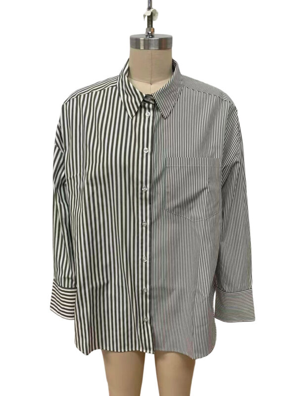 Women's long-sleeve striped button-down shirt with vertical black and white lines, classic collar, and front button closure, displayed on a mannequin.