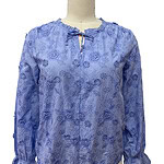 Light blue floral blouse with ruffled cuffs and tie-neck detail, perfect for casual or semi-formal wear.