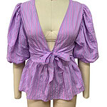 Colorful women's blouse with puff sleeves, deep V-neck, and front tie knot, perfect for summer fashion and casual outings.