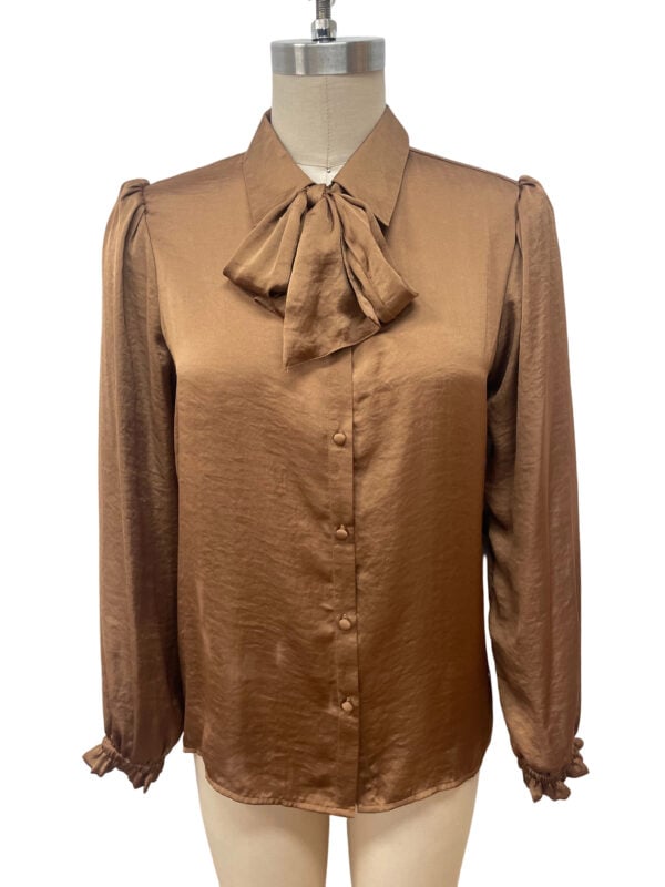Stylish brown satin blouse with a bow tie collar, long sleeves with ruffled cuffs, perfect for office or casual wear.