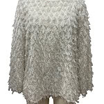 White textured women's sweater with a fluffy, layered design, perfect for winter fashion and cozy style.