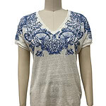 Women's casual top with intricate blue embroidery on the neckline and shoulders, made from lightweight fabric, perfect for summer wear.