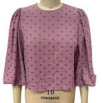 Pink women's blouse with small heart patterns, puffed three-quarter sleeves, and a round neckline, ideal for casual or semi-formal wear.