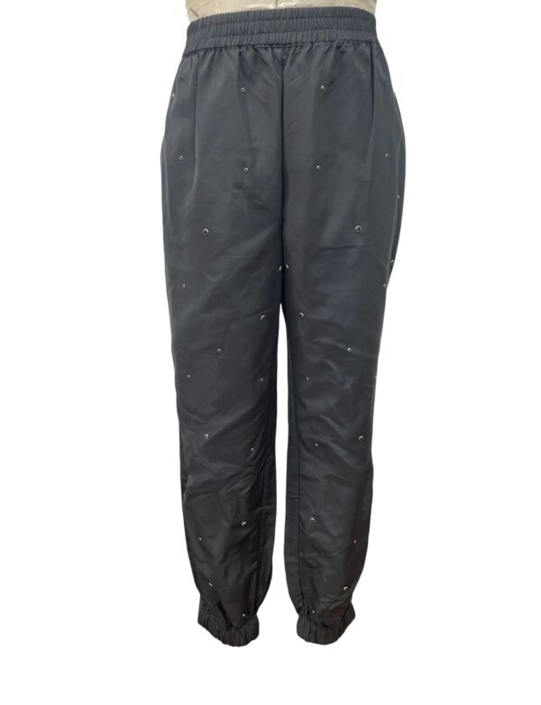 Black joggers with small embellishments and elastic cuffs, suitable for casual or athletic wear, displayed on a plain background.