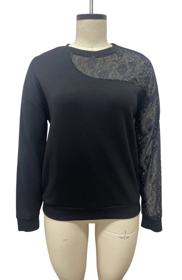 Stylish black women's sweater featuring sheer fabric with intricate patterns on the shoulder and sleeve, perfect for casual or semi-formal wear.
