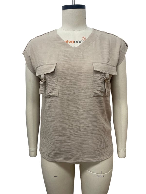 Beige casual women's top with front pockets and zip details, perfect for everyday wear and fashion-forward looks.