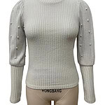 Cream-colored ribbed sweater with pearl embellishments on the shoulders and sleeves, featuring a fitted design and round neckline, perfect for stylish winter wear.