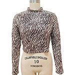 Stylish animal print long sleeve top with high neckline, perfect for fashion-forward women, displayed on a mannequin with a collapsible shoulder feature.