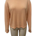 Stylish peach-colored women's knit sweater with gray trim around the neckline, perfect for casual or office wear.
