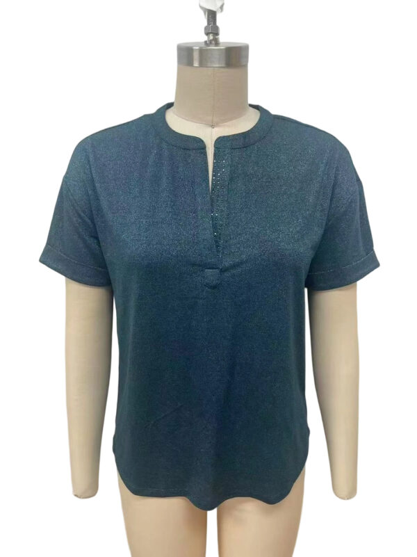 Stylish blue short-sleeve blouse with a subtle shimmer, round neckline, and front zipper detail, perfect for casual or office wear.
