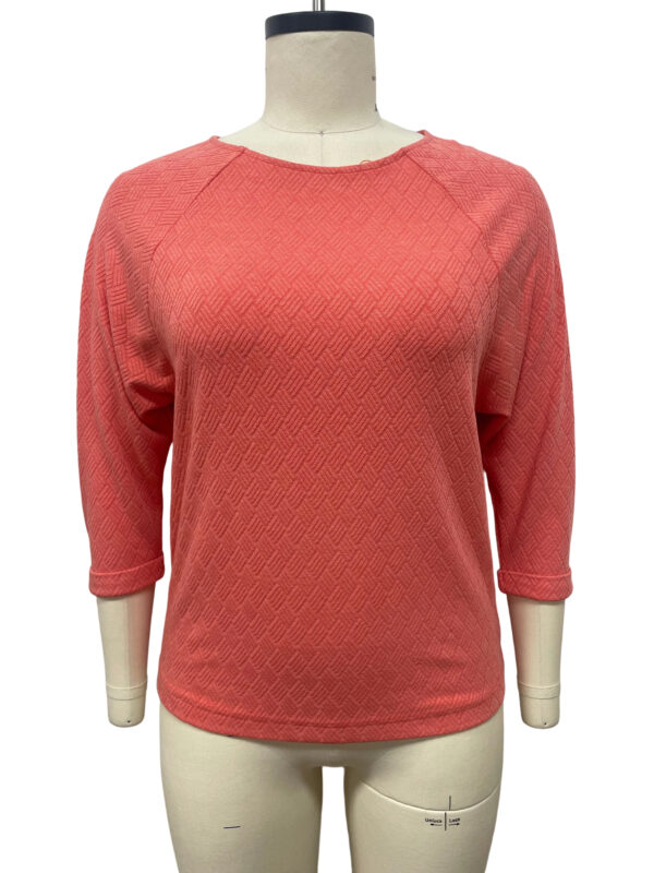 Coral women's sweater with 3/4 sleeves, textured knit fabric, casual style, perfect for fall and winter wear.