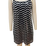 Black and silver sequin dress with chevron pattern, spaghetti straps, perfect for evening wear or parties.