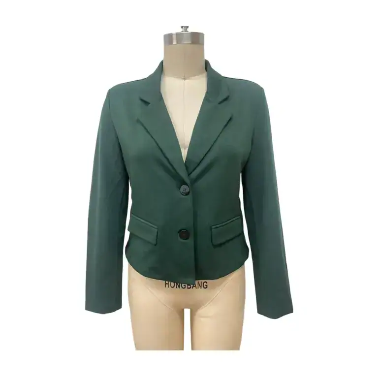 Stylish green women's blazer with tailored fit, notch lapel, and two front flap pockets, perfect for professional or casual wear.