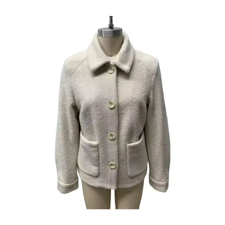 Light beige women's wool coat with large buttons and front pockets, perfect for fall and winter fashion.