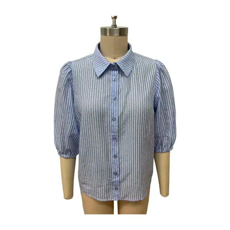Blue striped button-up shirt with puffed sleeves displayed on a mannequin, perfect for casual or office wear.