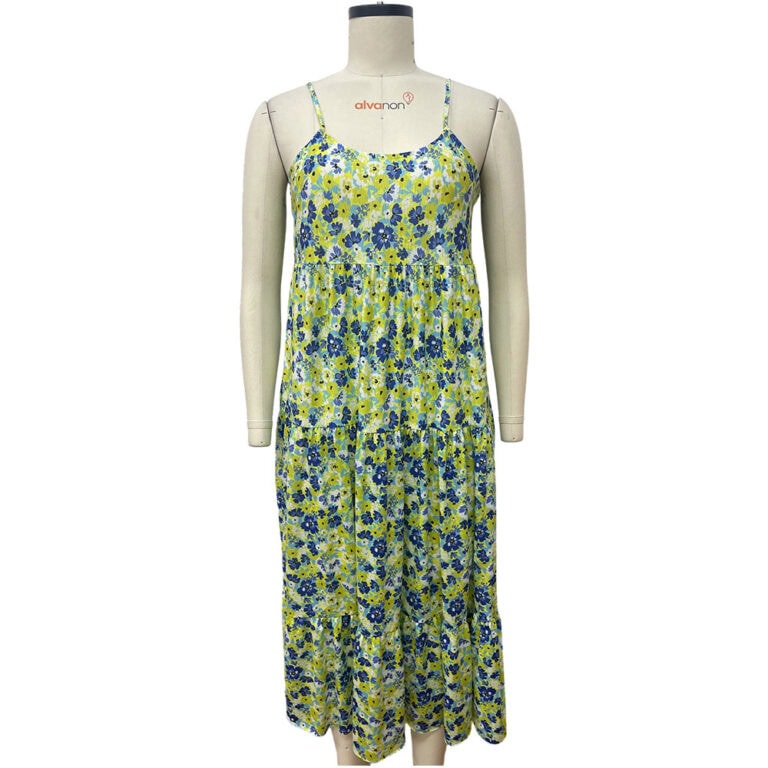 Bright floral summer dress with spaghetti straps, featuring a vibrant pattern of blue and yellow flowers, perfect for casual or beachwear.