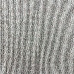 Close-up of beige ribbed fabric texture, ideal for clothing and fashion design.