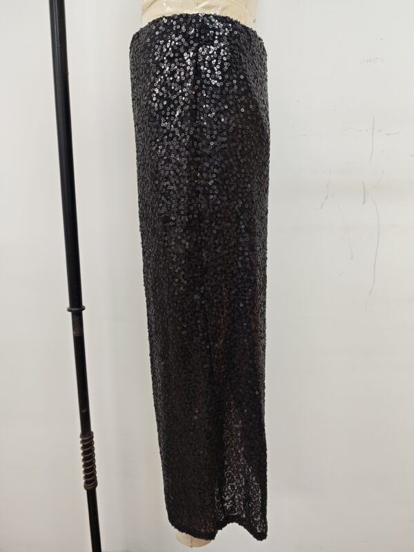Black sequin maxi skirt for women, stylish evening wear, perfect for parties and special occasions.