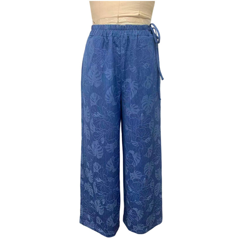 Relaxed fit blue floral pants with an elastic waistband and drawstring, perfect for casual wear and summer outings.