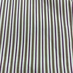 Close-up of striped fabric with green, purple, and beige vertical lines, suitable for clothing or accessories.