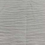Close-up of a light gray wooden surface with subtle grain texture, ideal for fashion product displays or background settings.