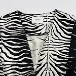 Stylish black and white zebra print blazer for women, perfect for casual or formal wear, made from high-quality fabric, available at nbfish-fashion.com.