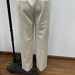Comfortable beige sweatpants with elastic waistband and back pockets, perfect for casual wear and lounging.