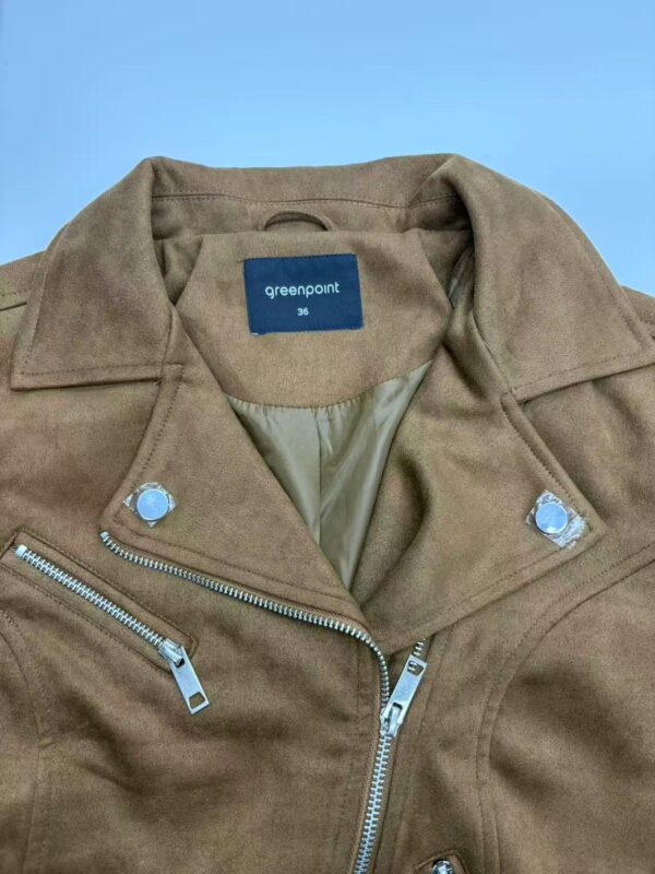Close-up of a stylish brown leather jacket with silver zippers and snap buttons, perfect for men's fashion and casual wear.