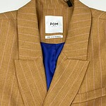 Elegant brown pinstripe blazer with a notched lapel, tailored fit, and a single chest pocket, perfect for professional or casual wear.
