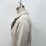 Stylish beige women's jacket displayed on a mannequin, perfect for casual or semi-formal wear, showcasing modern fashion trends.