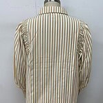 Elegant women's button-up shirt with vertical beige and white stripes, featuring puffed sleeves and a classic collar, perfect for casual or office wear.