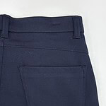 Close-up of navy blue women's pants showing back pocket and waistband details, suitable for casual or professional wear.