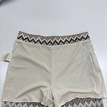 Stylish women's shorts with patterned leggings, perfect for casual wear and comfortable fashion.