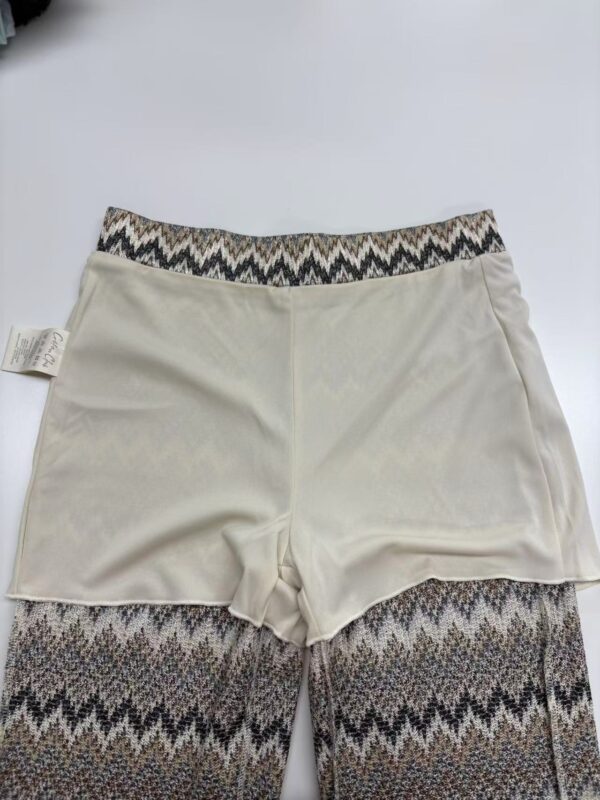Stylish women's shorts with patterned leggings, perfect for casual wear and comfortable fashion.