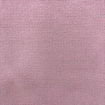 Close-up of pink knitted fabric showcasing fine texture and detailed stitching, ideal for fashion and textile design.