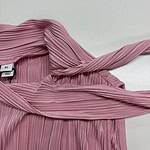 Elegant pink pleated dress with a matching belt, perfect for stylish occasions and fashion-forward outfits.