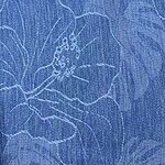 Close-up of blue fabric with delicate floral embroidery, showcasing intricate stitching and elegant design suitable for fashion and home decor.