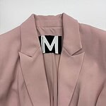 Stylish pink blazer with tailored fit, perfect for office or casual wear, featuring a classic lapel collar and sleek design.