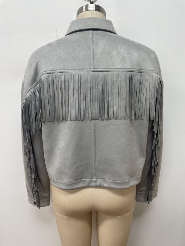 Stylish grey leather jacket with fringe details on sleeves and back, perfect for casual or boho fashion styles.