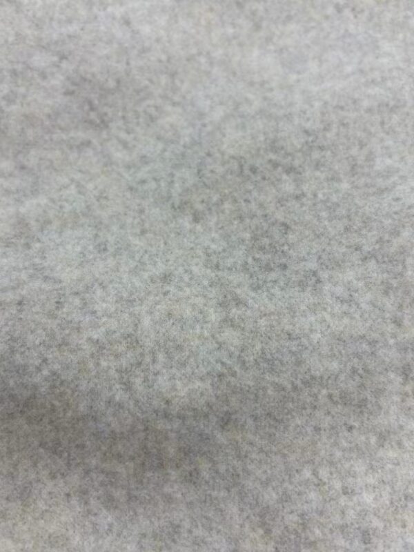 Close-up of soft gray fabric texture suitable for fashion and textile design projects.