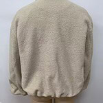 Elegant beige wool coat displayed on a mannequin, perfect for fall and winter fashion, showcasing classic style and high-quality material.