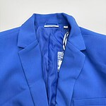 Vibrant blue blazer with tailored fit, perfect for professional or casual wear, displayed on a plain background.