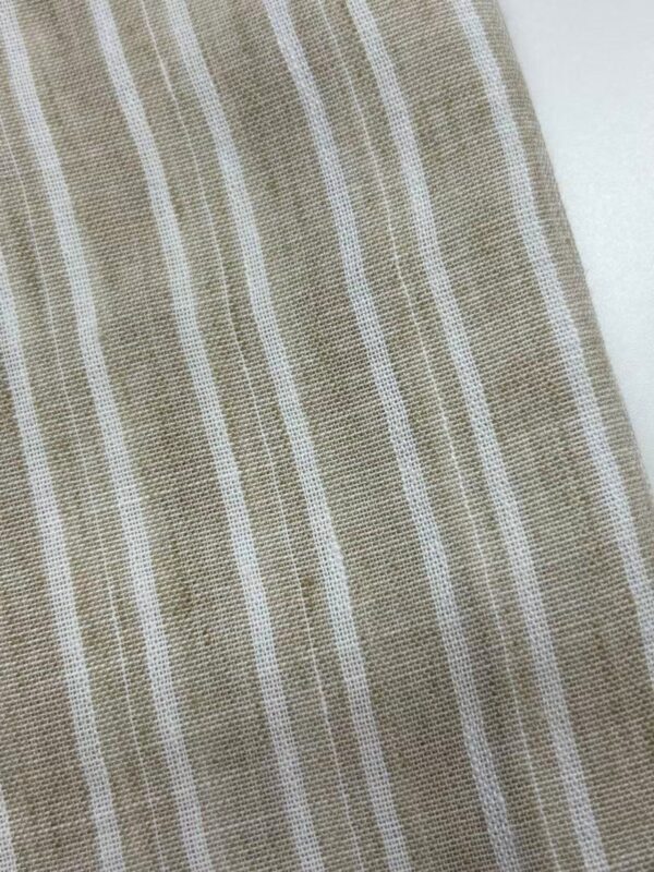 Close-up of beige fabric with white vertical stripes, suitable for clothing or home decor.