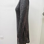 Long black sequin dress with full sleeves, perfect for evening events and parties, displayed on a mannequin against a plain white background.