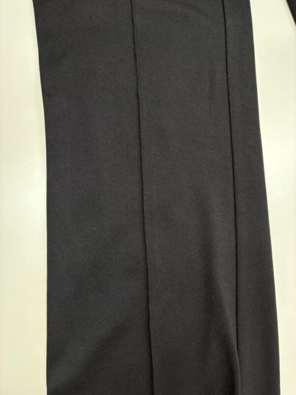 Elegant black formal trousers for men, suitable for office wear and special occasions, made from high-quality fabric with a tailored fit.