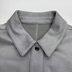 Close-up of a grey polo shirt with a buttoned collar, perfect for casual or semi-formal wear, showcasing high-quality fabric and modern design.