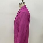 Stylish pink blazer for women, tailored fit with lapel collar and button details, perfect for office or casual wear.