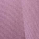 Close-up of pink mesh fabric with small perforations, ideal for fashion and clothing design projects.