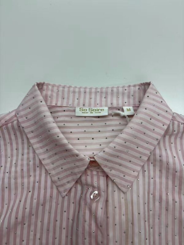 Pink striped blouse with silver polka dots, casual style, medium size, suitable for everyday wear.